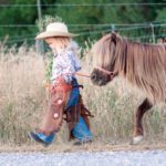Little girl with pony
